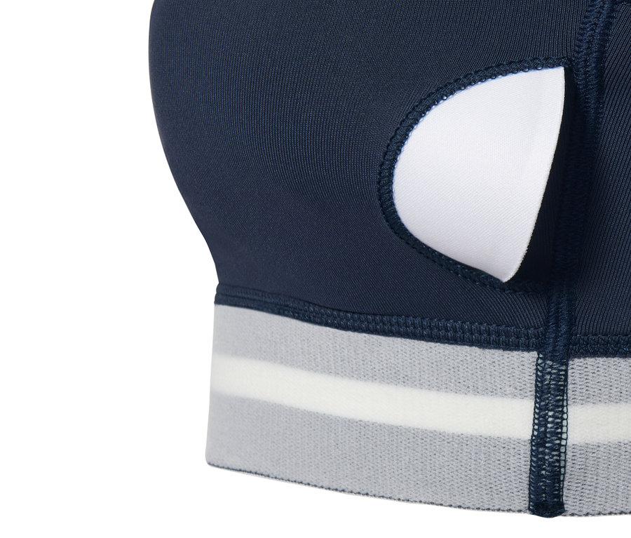 Detailansicht des dunkelblauen Sport-Bustiers »Long Line« mit weißer Füllung.