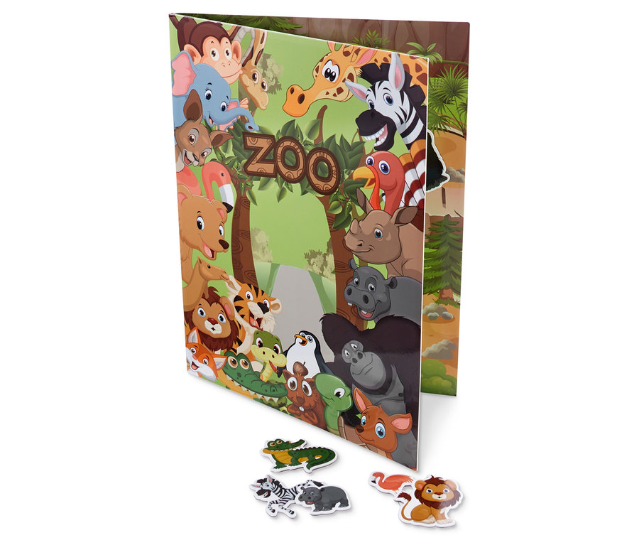 Ein geöffnetes Magnet-Spielbuch mit einem Zoo-Motiv und ein paar davor liegenden Tiermagneten.