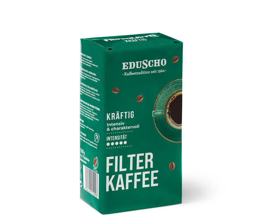 Eine 500g Packung Eduscho Filterkaffee Kräftig Gemahlen. Grüne Packung mit Kaffeetasse.