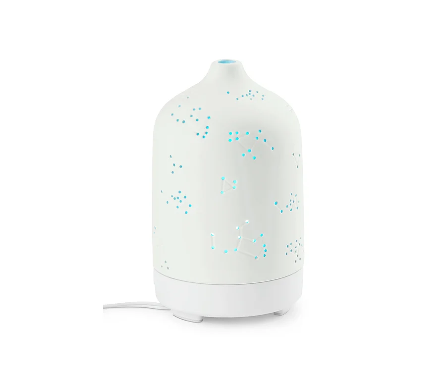 Weißer Aromadiffusor mit Wellnessbeleuchtung.