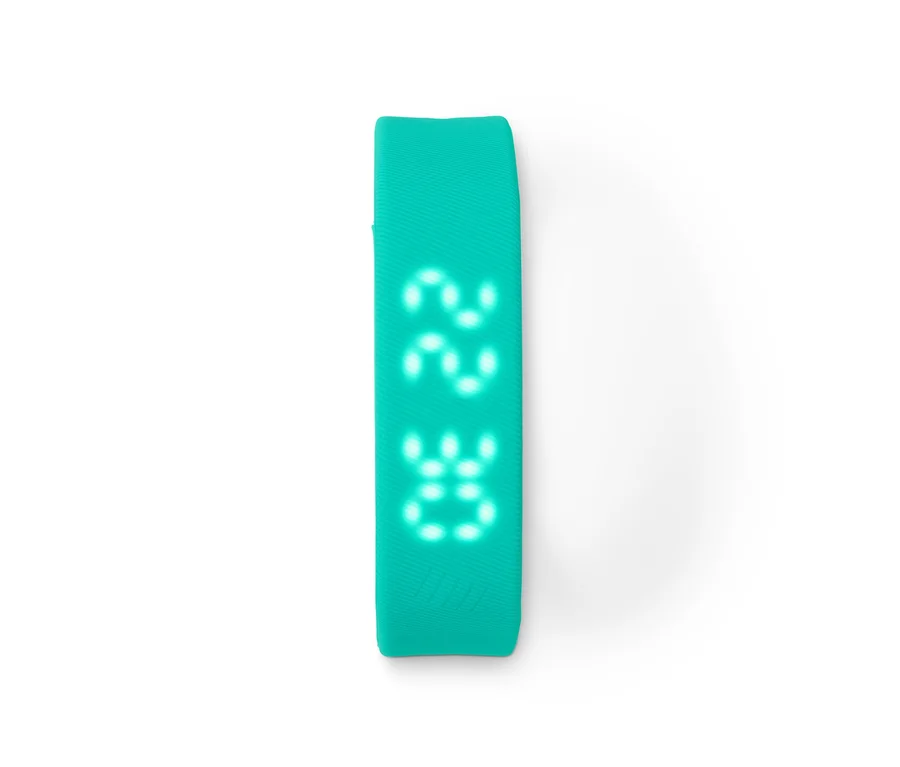 Der Schrittzähler mit Uhr hat ein grünes Armband und eine Digitalanzeige.