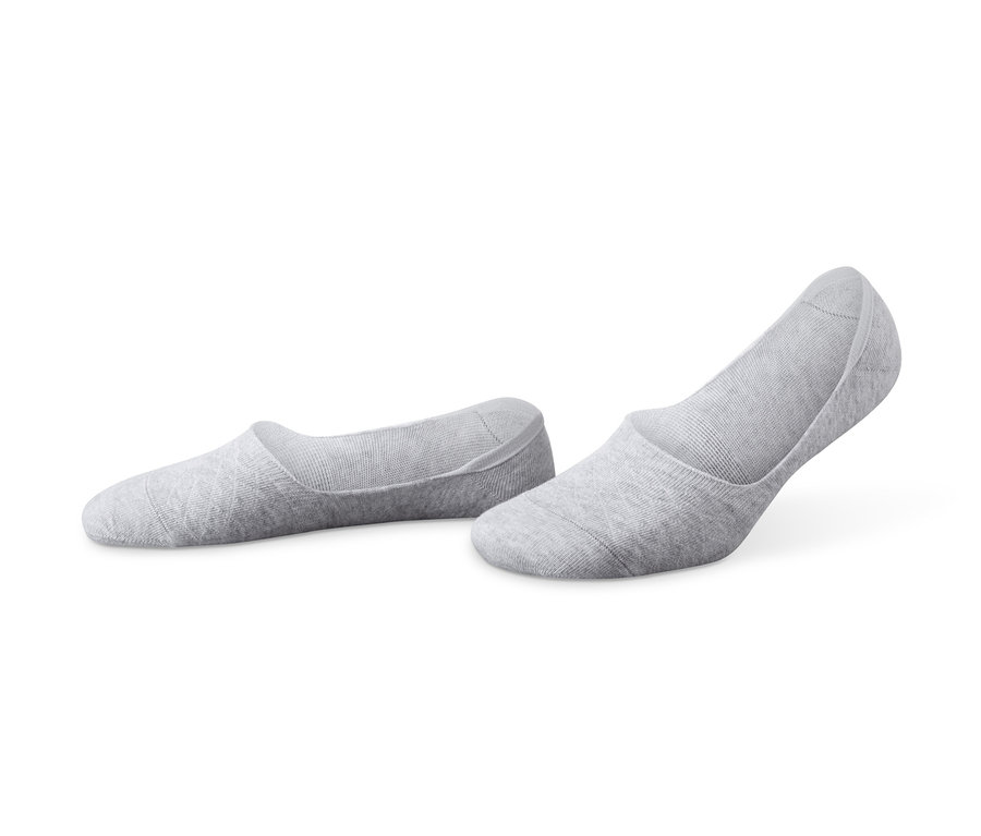 Zwei Paar graue Sneaker-Füßlinge.