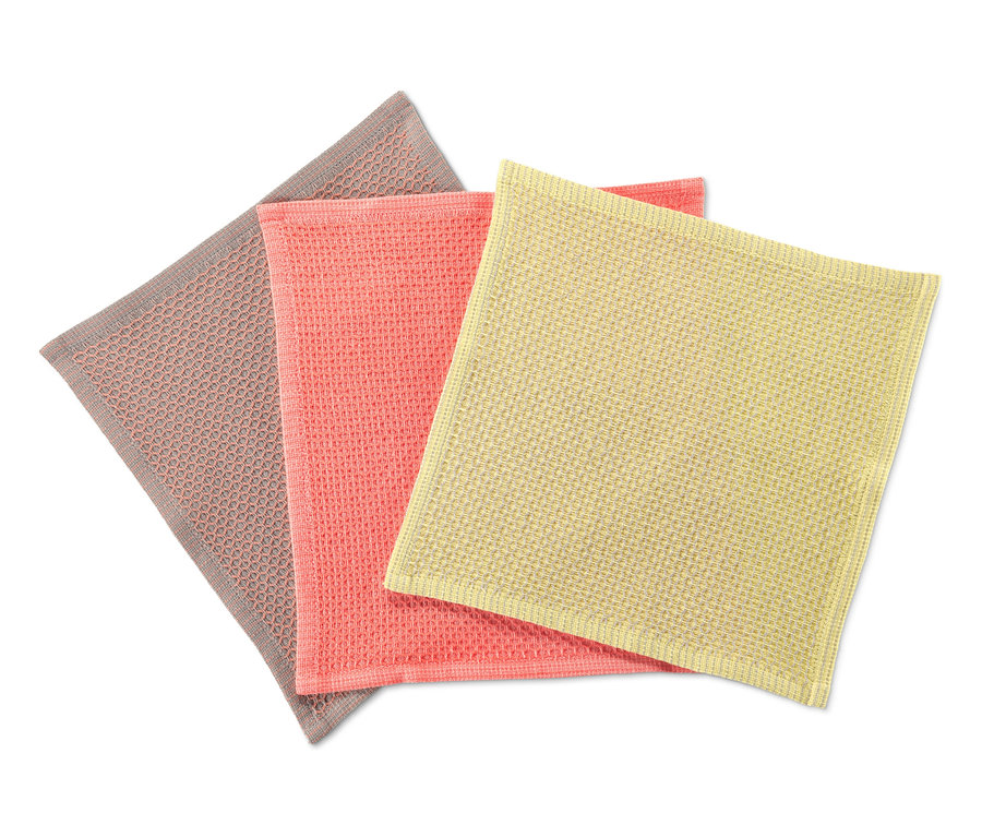 Drei Spültücher in Grau, Rosa und Gelb.