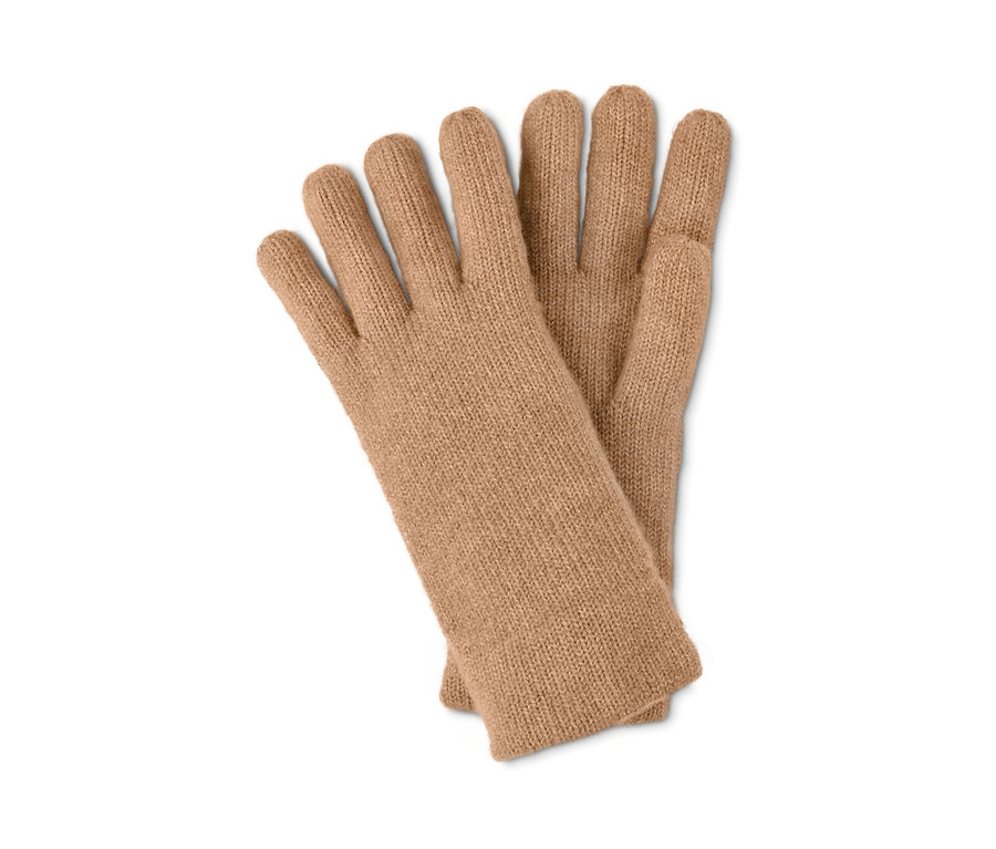 Beige Strickhandschuhe.