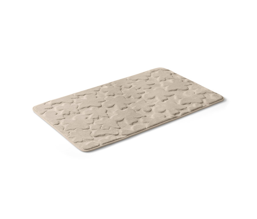 Eine beige Komfort-Badematte, ca. 60 x 100 cm.