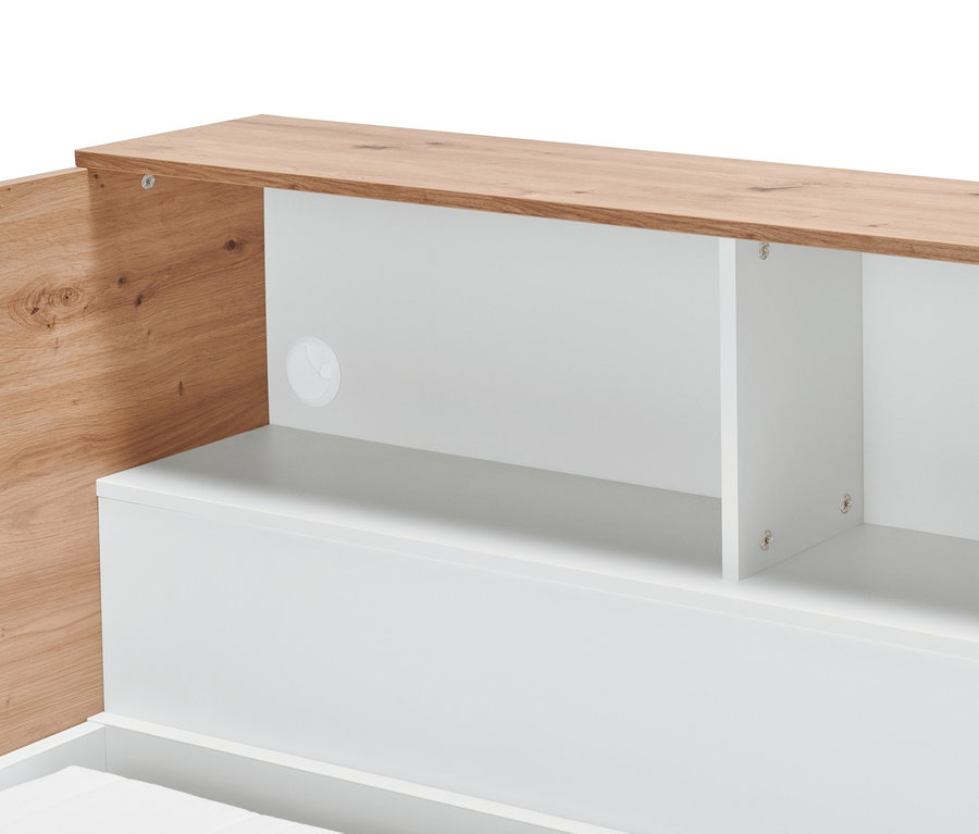 Detailansicht eines weißen Stauraum-Bettes mit einem Kopfteil in Holzoptik.