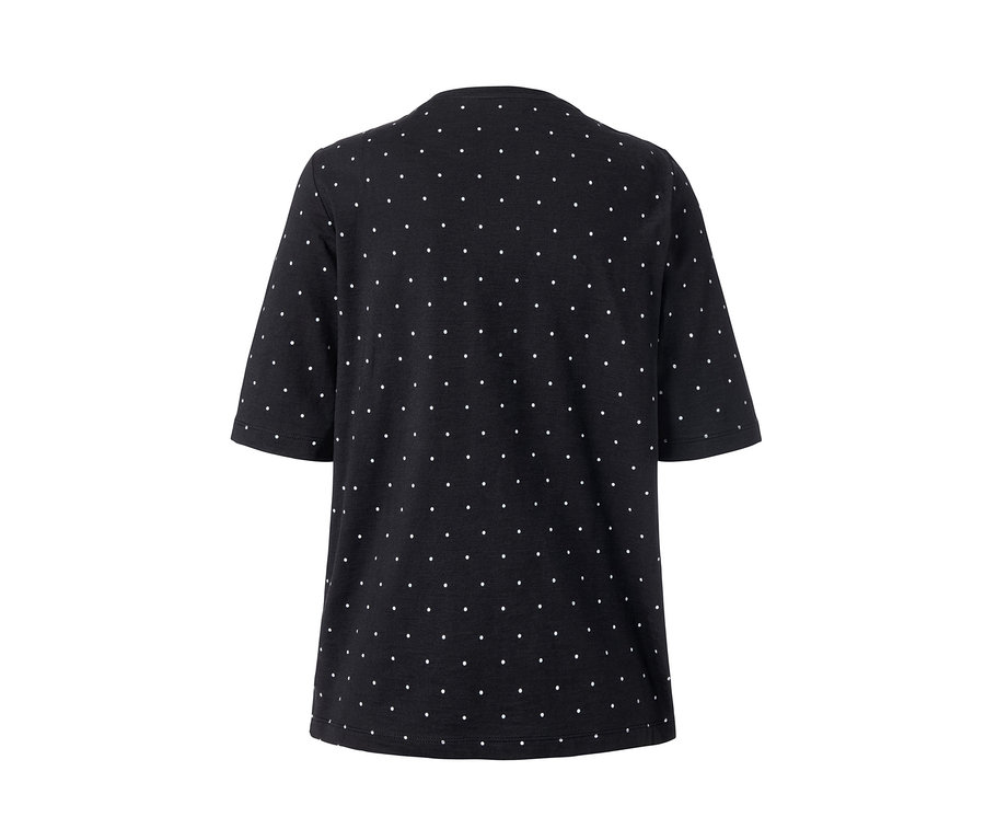 Schwarzes T-Shirt mit weißen Punkten.