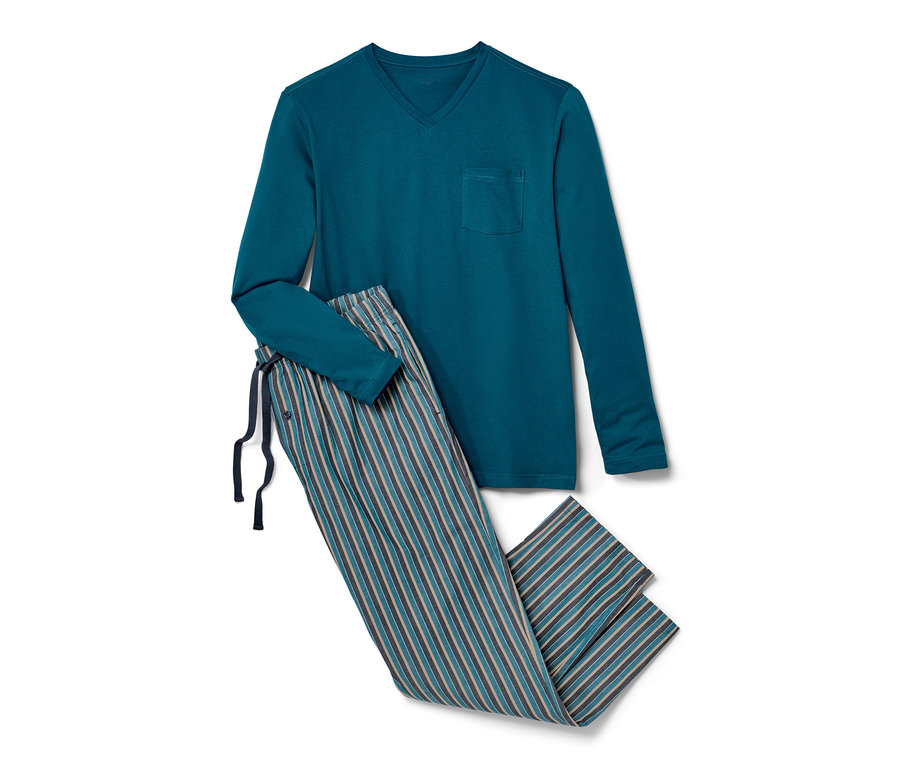 Ein marineblauer Pyjama mit gewebter Hose liegt gefaltet.