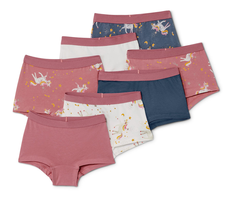 Sieben Mädchen-Pantys in verschiedenen Farben mit Einhorn-Motiven.