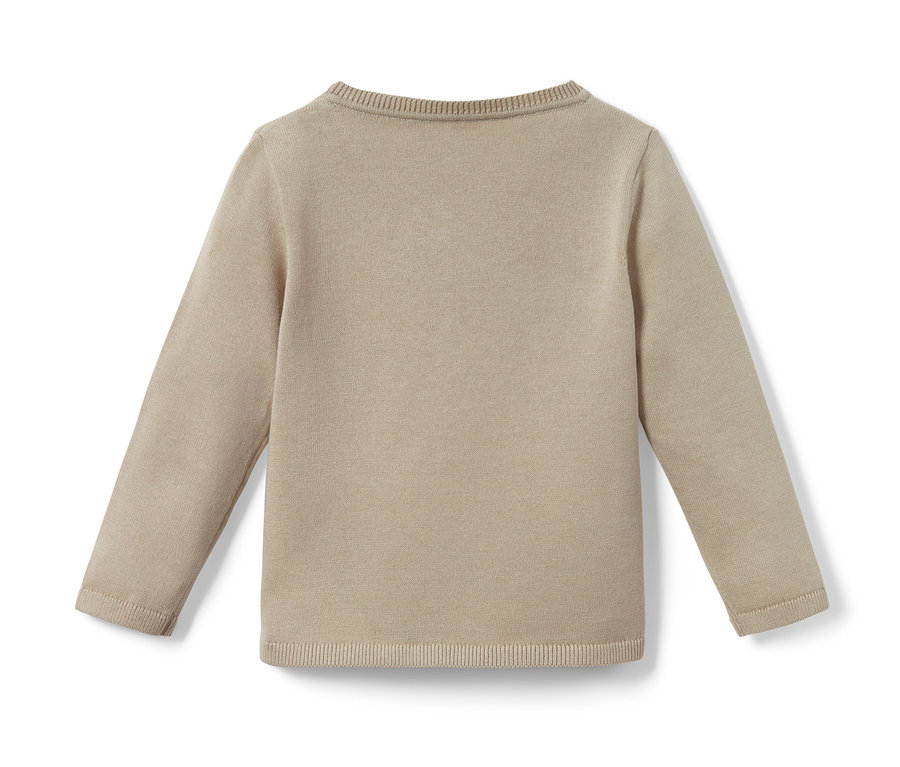 Detailaufnahme einer Baby-Strickjacke.