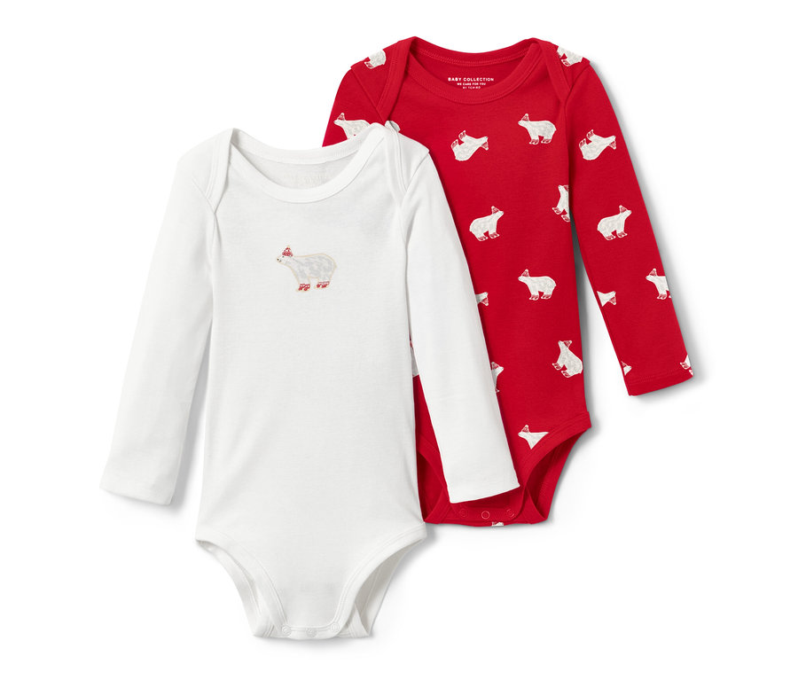 Zwei Kinder-Langarmbodys: ein weißer mit Eisbären-Motiv, ein roter mit Eisbären-Allover-Print.