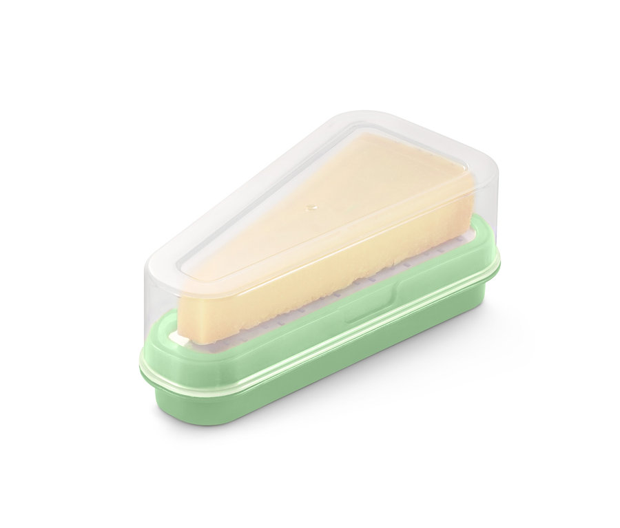 Käsestück in einer grünen 2-in-1-Parmesanreibe mit transparentem Deckel.