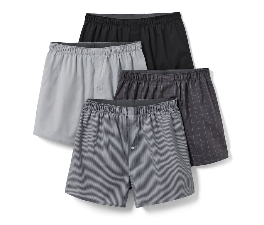 Vier Web-Boxershorts in verschiedenen Farben.