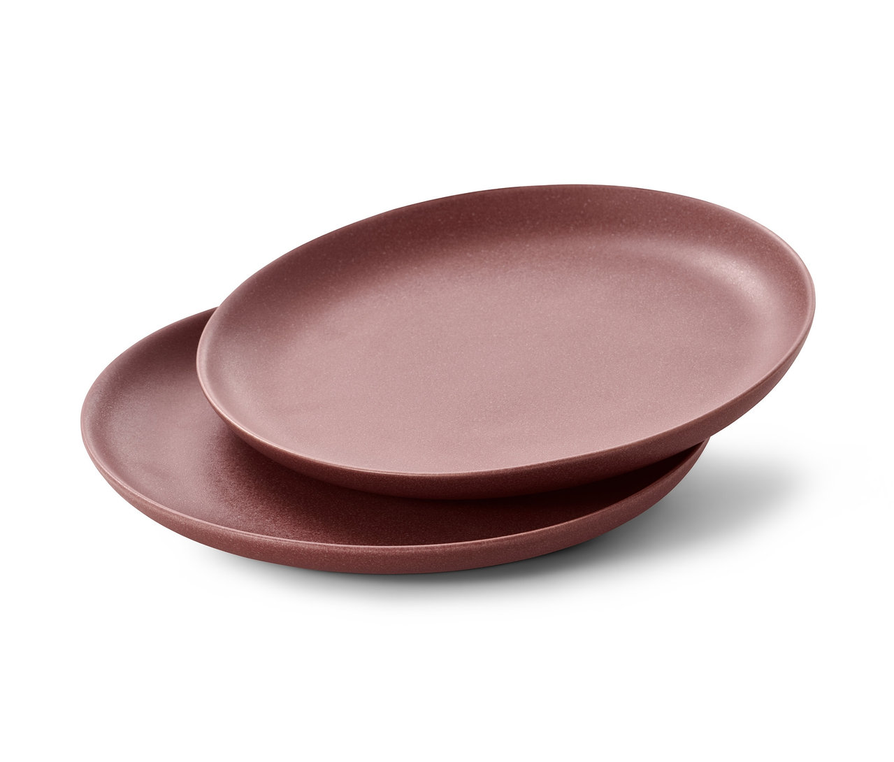 Zwei Teller liegen übereinander.