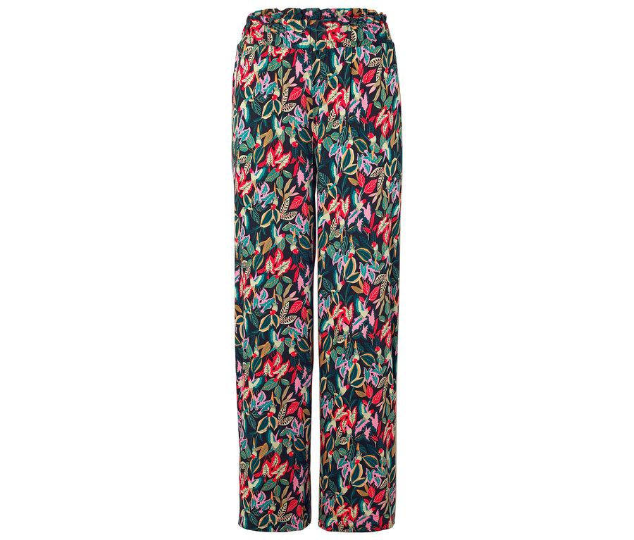 Eine lange Hose mit einem bunten Blattmuster auf dunklem Grund.