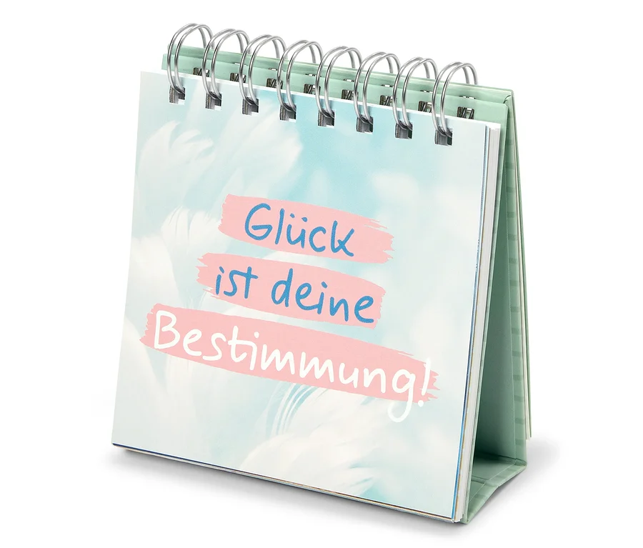 Tischkalender zeigt den Spruch "Glück ist deine Bestimmung!"