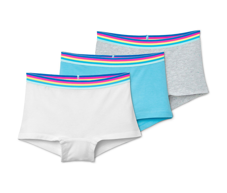 Drei Mädchen-Pantys in Weiß, Blau und Grau mit farbigem Bund.