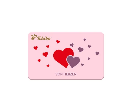 Rosa Geschenkkarte mit Tchibo Logo, roten und lila Herzen sowie dem Schriftzug "VON HERZEN".