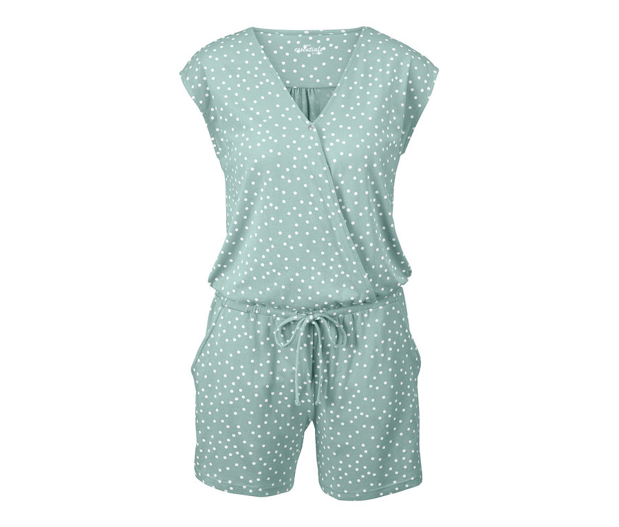 Ein Jumpsuit-Pyjama mit weißen Punkten.