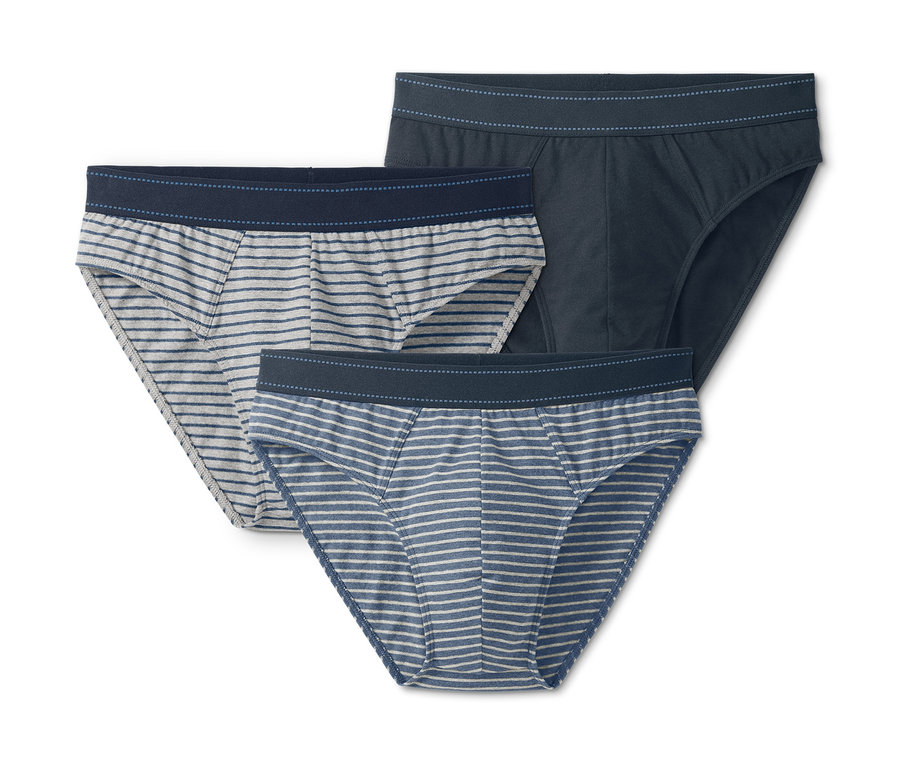 Drei Slips: eine marineblau, eine blau-weiss gestreift, eine grau-weiss gestreift.