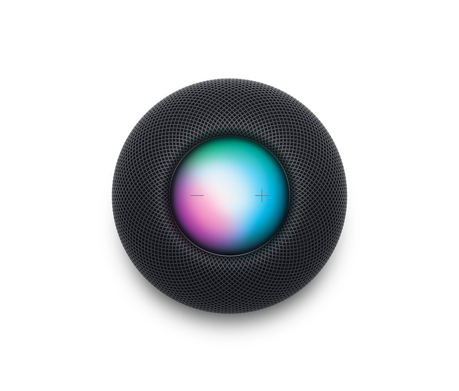 Ein schwarzer Apple HomePod mini auf weißem Hintergrund.
