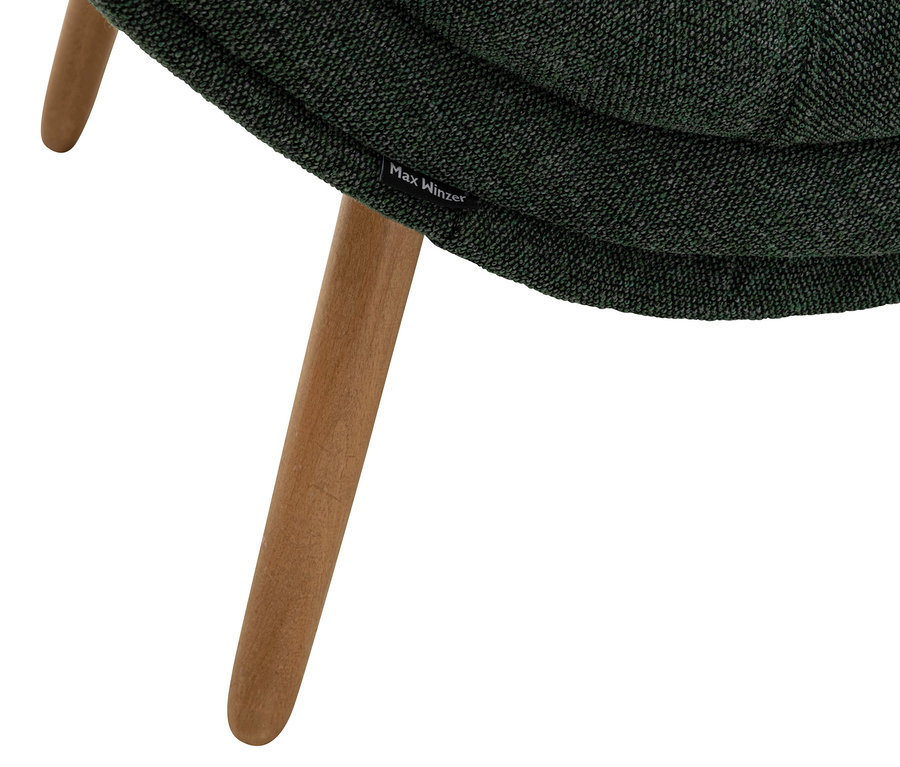 Detailansicht eines grünen Relaxsessels "Sören" mit Holzbein.