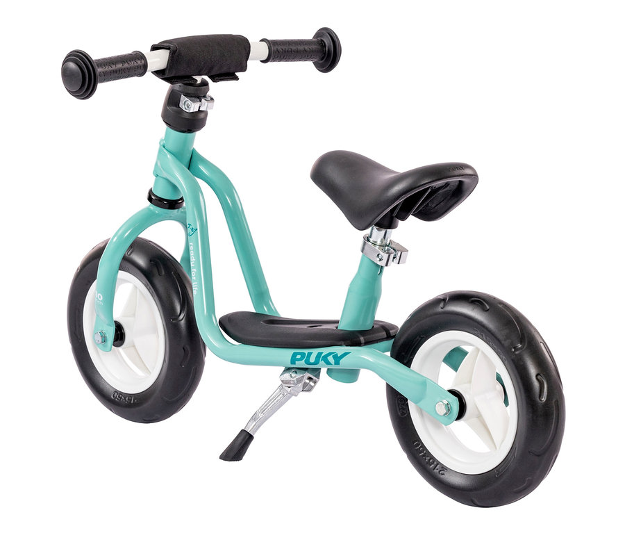 Detailaufnahme eines aqua grünen PUKY Laufrads LR M mit schwarzem Sattel und Reifen.