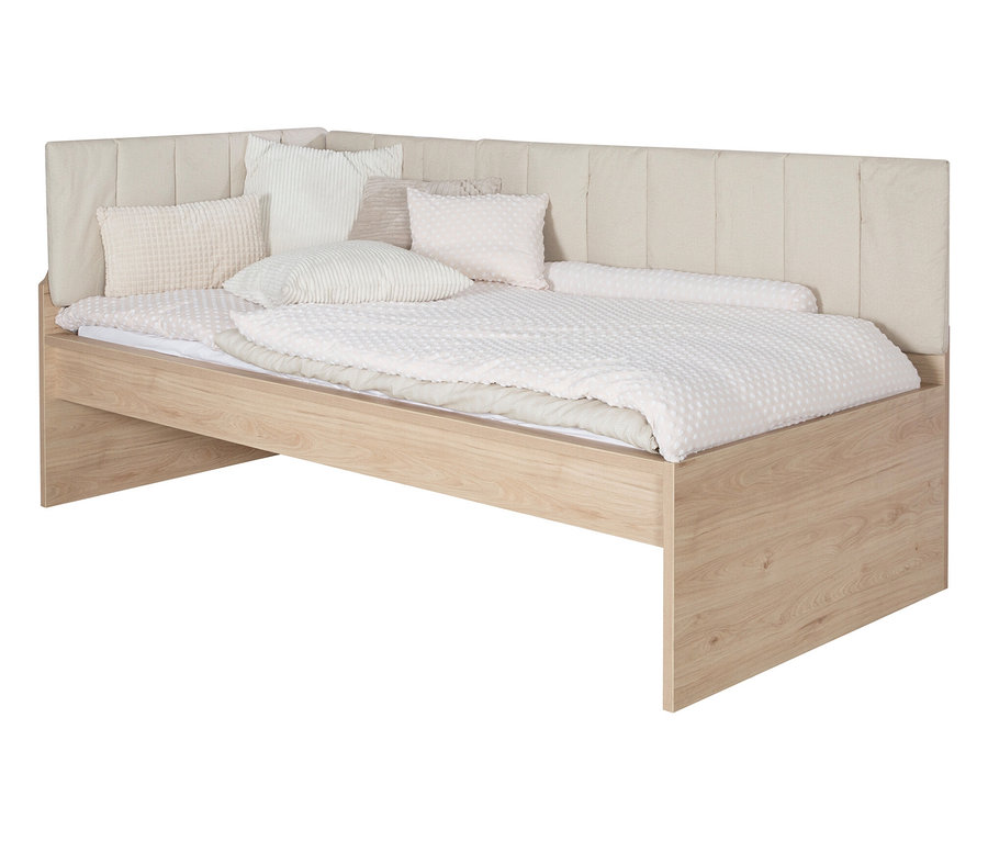 Ein Roba Jugendbett »Louisa«, 90 x 200 cm mit hellbeigem Kopfteil und mehreren Kissen.
