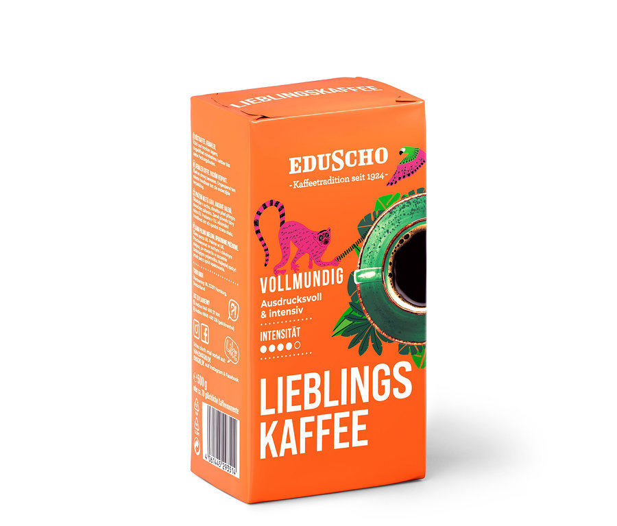Orangefarbene Packung Eduscho Lieblingskaffee gemahlener Kaffee mit einer Abbildung eines Affen und einer Tasse Kaffee.