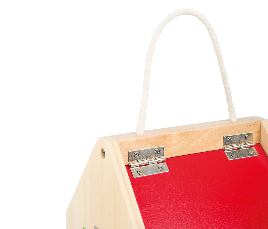 Detailansicht des small foot Schlosshaus aus Holz mit rotem Dach und Seilgriff.