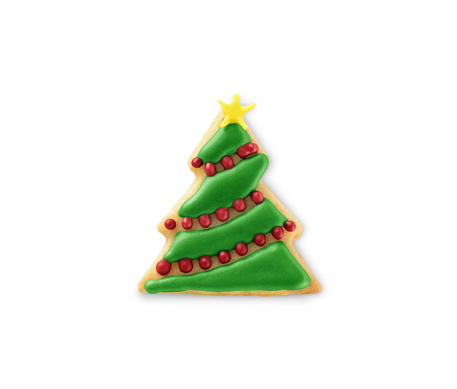 Verzierter Keks in Form eines Weihnachtsbaums mit XL-Keksausstecher.