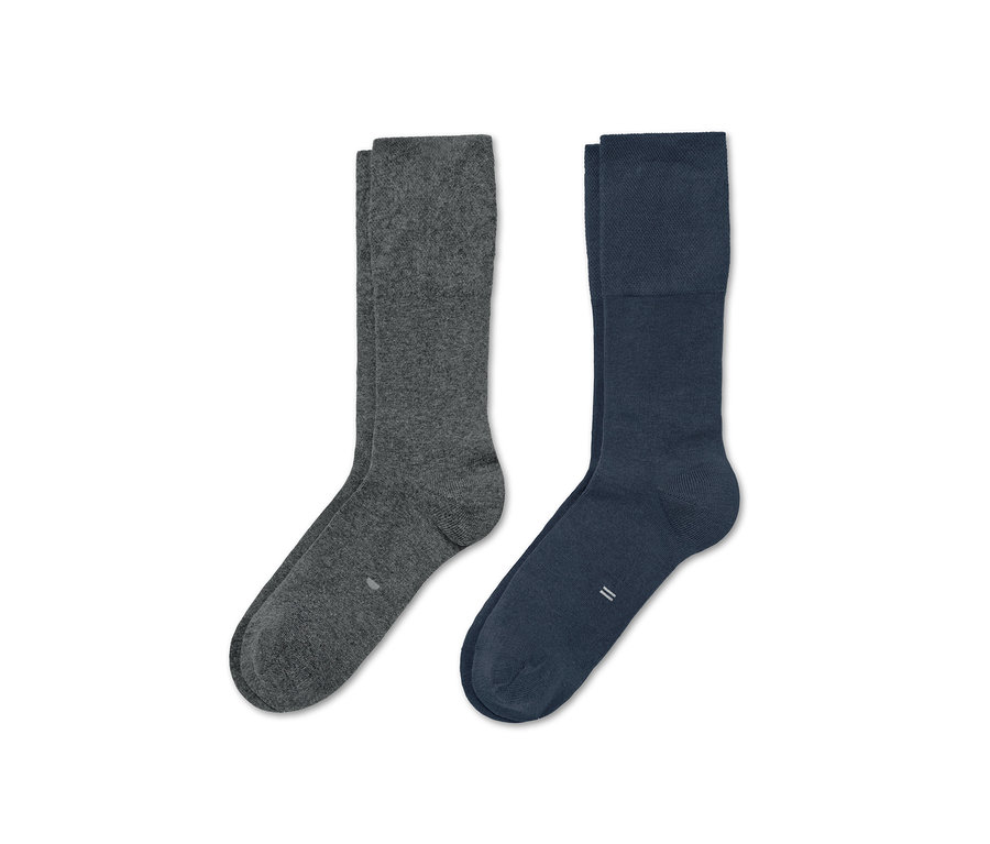 Zwei Paar Diabetikersocken: ein Paar grau, ein Paar dunkelblau.