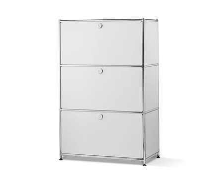 Ein weißes Metallregal mit drei Klappfächern.