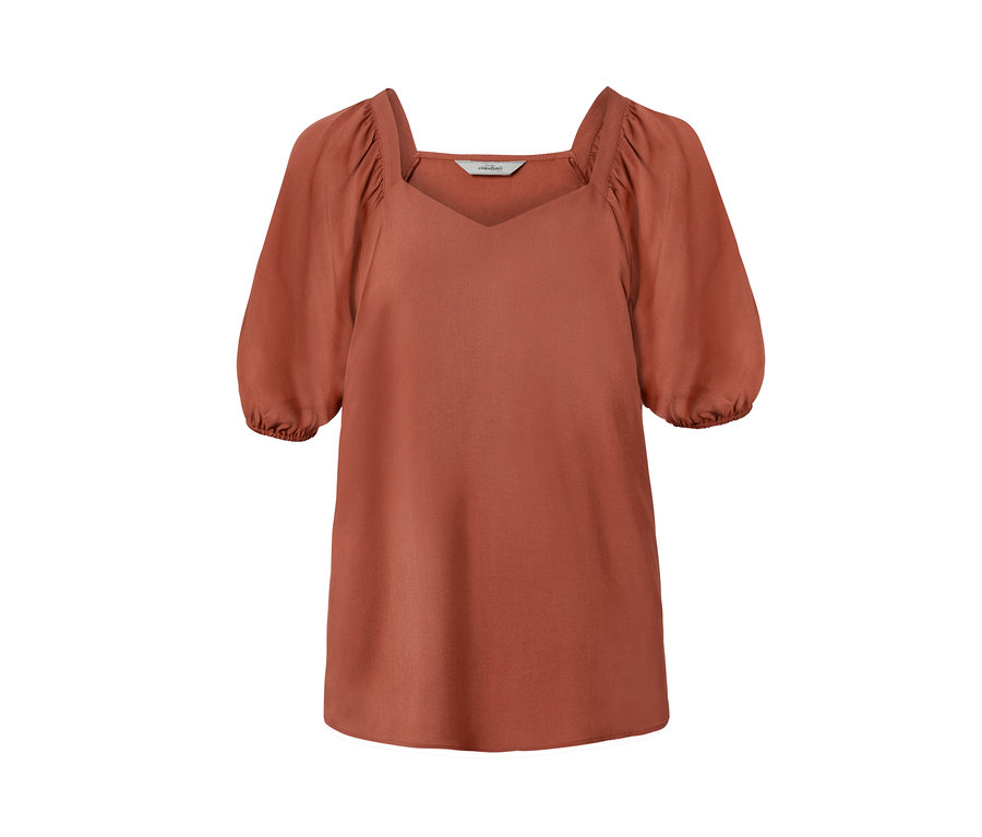 Orange Bluse mit kurzen Puffärmeln und eckigem Ausschnitt.