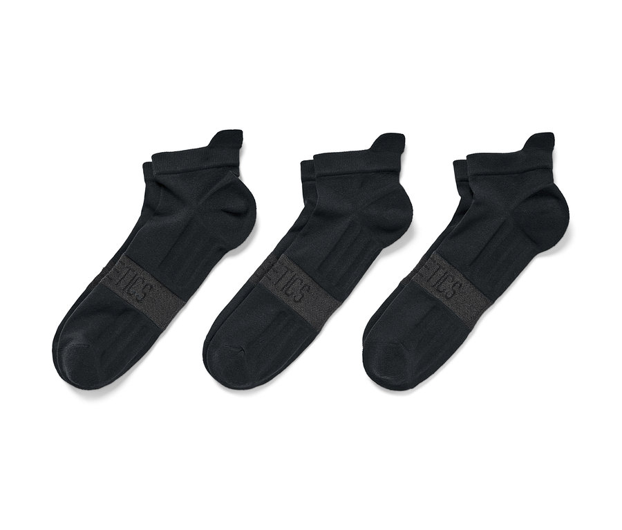Drei Paar Profi-Laufsocken liegen nebeneinander.
