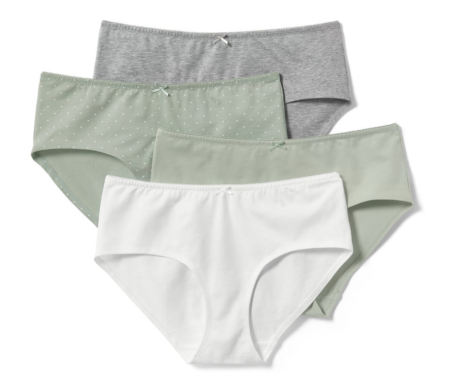 Vier Pantys, Basic-Schnitt, eine hellgrün mit Punkten, eine hellgrün, eine weiß und eine grau.