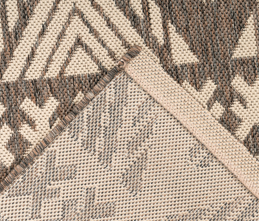 Detailansicht eines Kayoom Outdoor-Teppichs »Splash 500« in Creme mit geometrischem Muster.