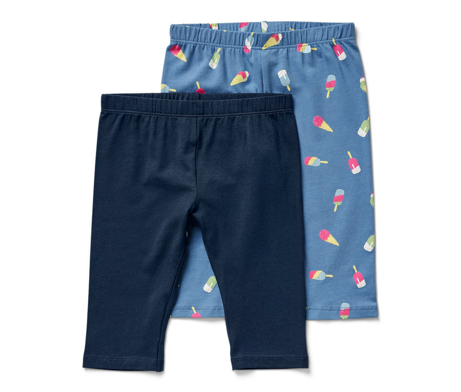 Zwei blaue 3/4-Kinderleggings.