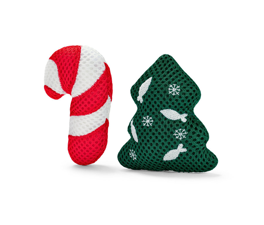 Katzen-Spielzeug in Form eines rot-weißen Zuckerstabs und eines grünen Weihnachtsbaums.