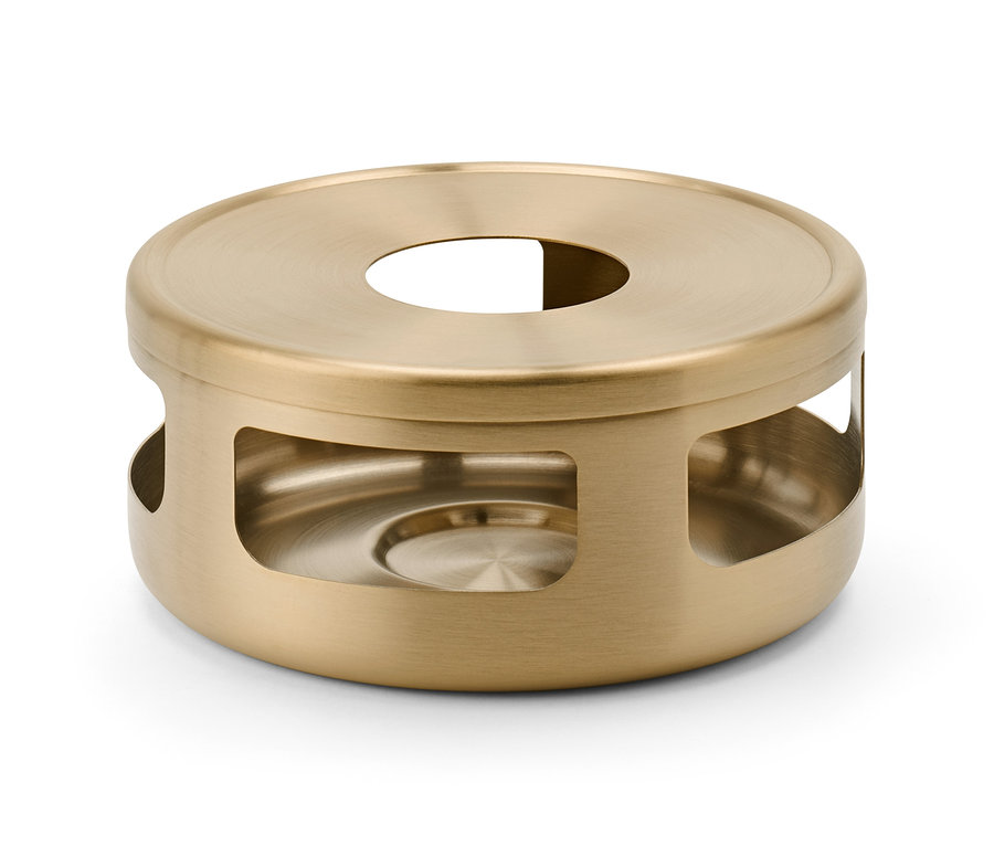 Nahaufnahme eines goldenen Stövchens.