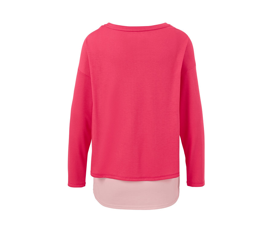 Detailansicht der Rückseite eines pinken 2-in-1-Sportshirts.