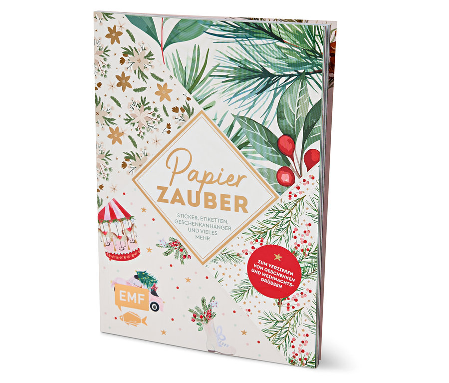 Buch mit Weihnachtsmotiv und dem Schriftzug Papier Zauber.