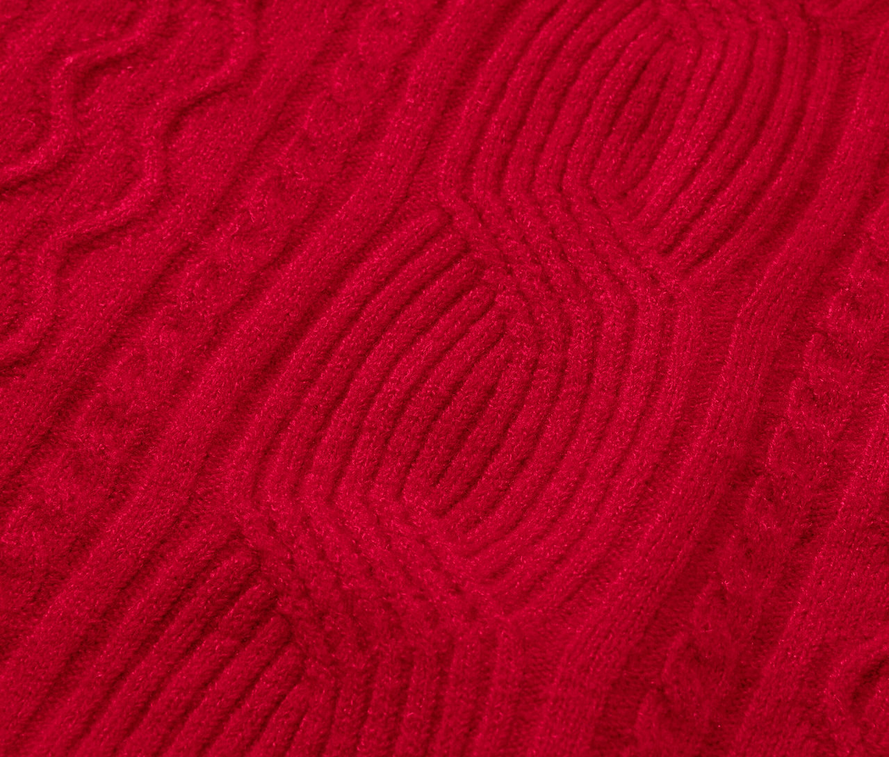 Detailaufnahme eines roten Strickmusters.