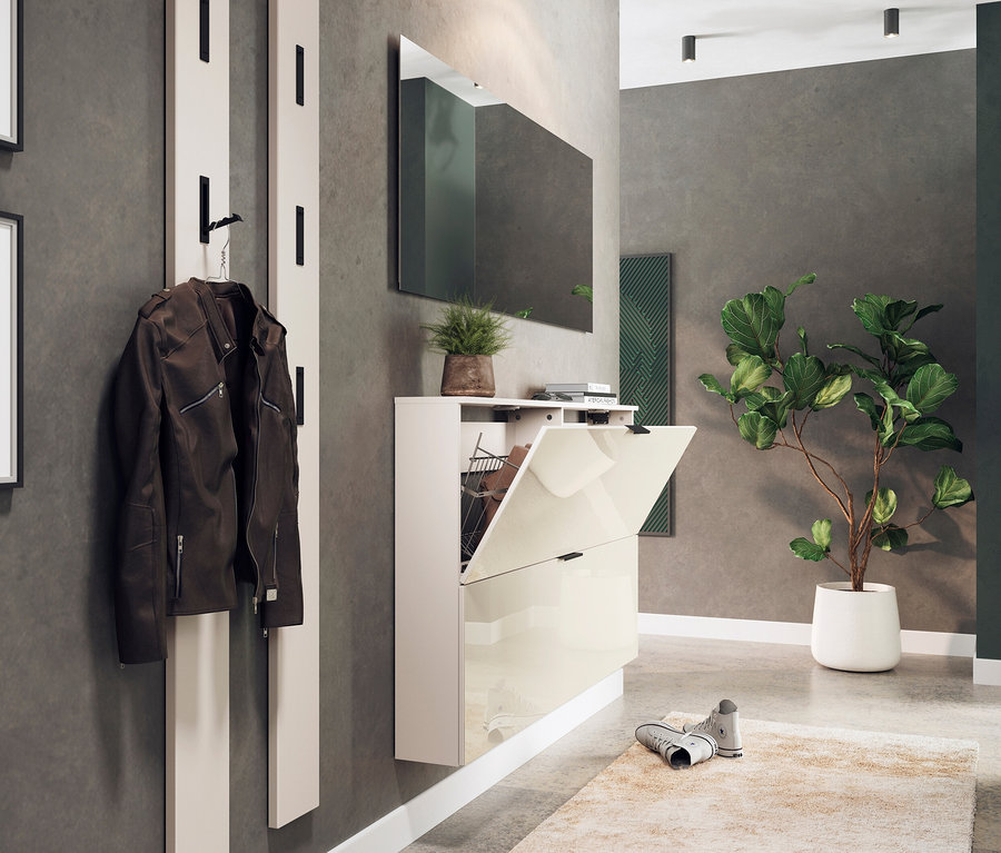 Eine braune Jacke hängt an einer weißen Garderobe neben einem Schuhschrank »Valega«, kaschmir, mit offener Tür.