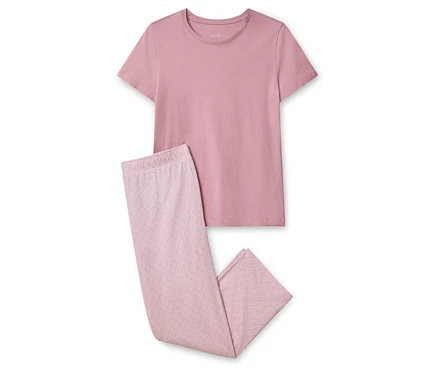 Rosa Schlafanzug Set bestehend aus einem T-Shirt und einer Hose mit Blattmuster.