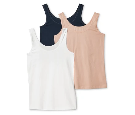 Drei Tanktops in Weiß, Beige und Marineblau liegen übereinander.