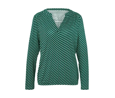 Grüne Damenbluse mit weißen Punkten und langen Ärmeln.