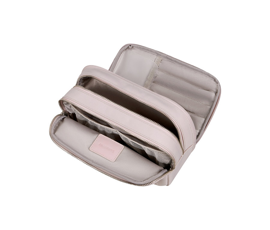 Offene rosafarbene Samsonite IMAGE Toilet Kit Pouch mit mehreren Fächern und Netzinnentaschen.