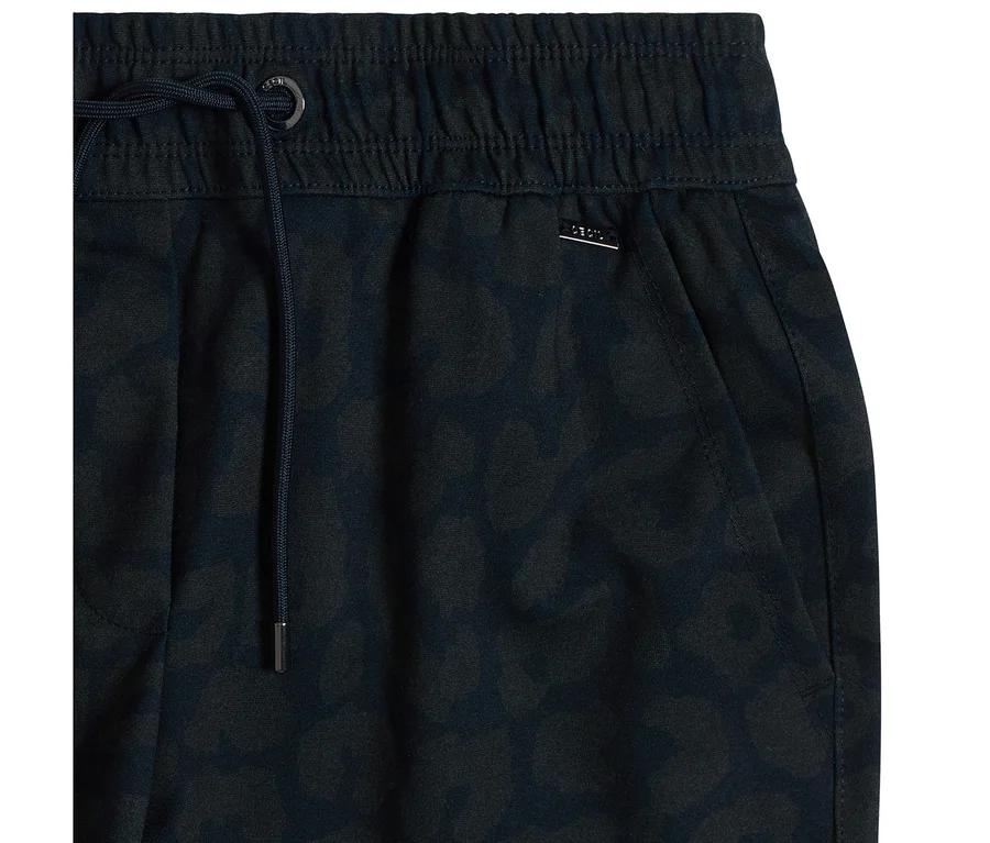 Dunkelblaue CECIL Jerseyhose mit Gummibund, Kordelzug und dezentem Alloverprint.