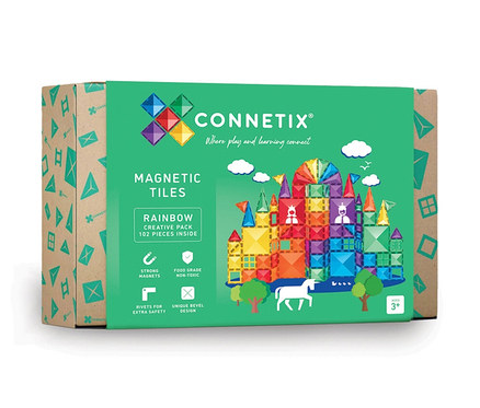 Grüne Verpackung des Connetix Magnetspielzeug-Sets, Creative Pack, 102-teilig, mit einer Abbildung einer Burg aus bunten Magnetfliesen, einem Einhorn und Bäumen.